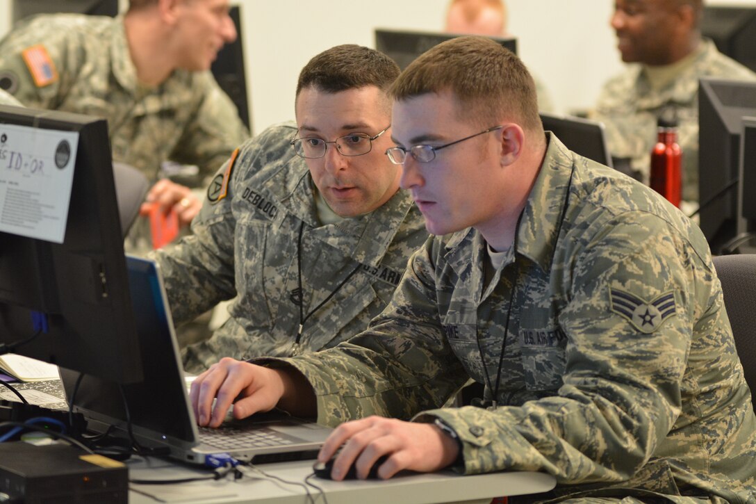 US military communicate on computer