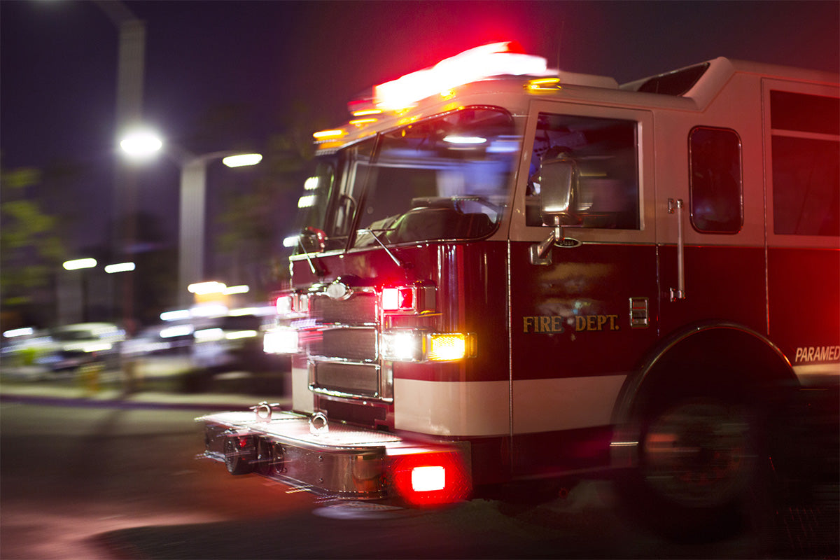 Fire truck driving at night